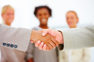 bigstockphoto_Business_People_Shaking_Hands